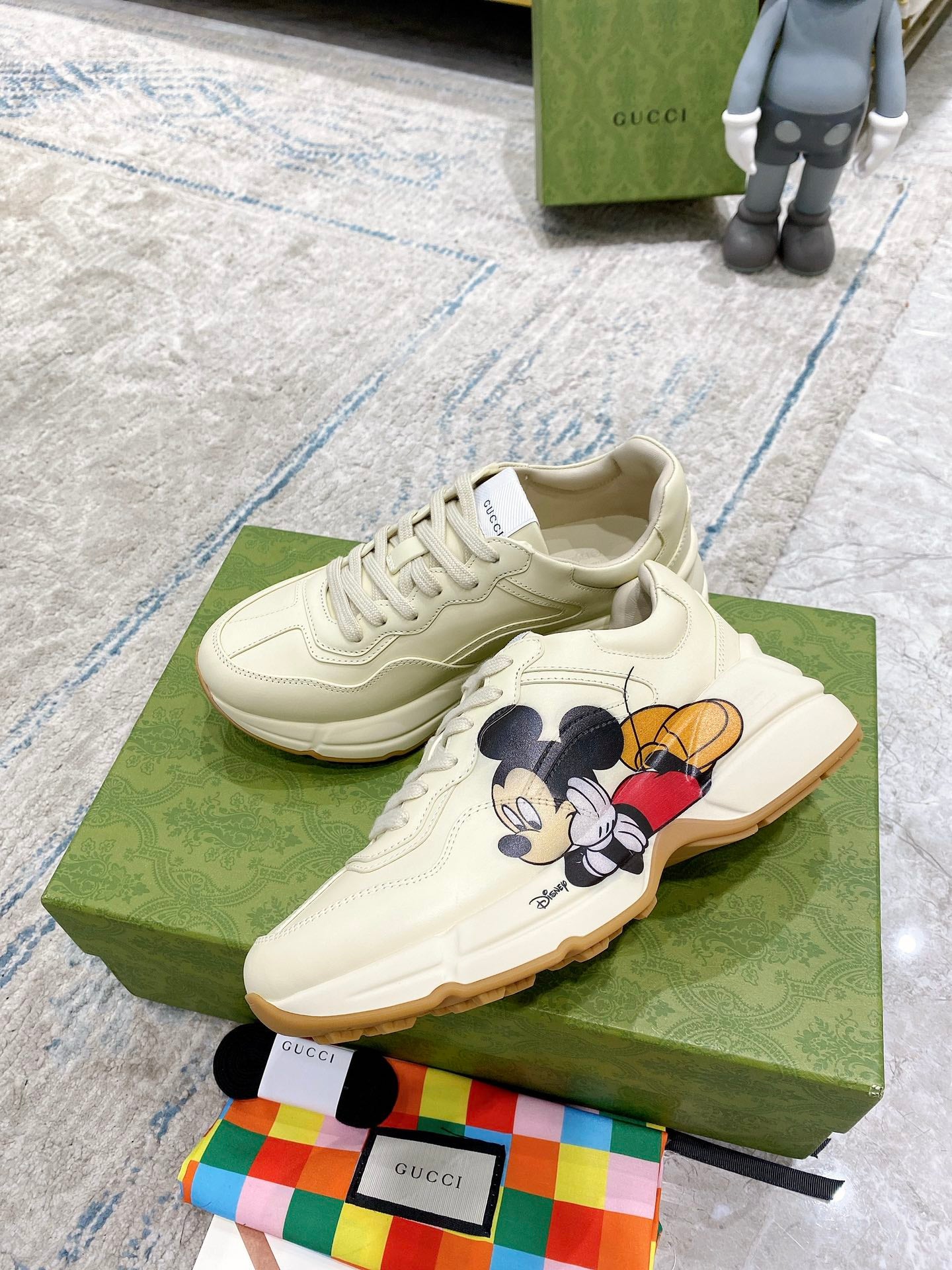 Gucci unisex sneakers, cream leather with Mickey Mouse graphic and gum-colored sole