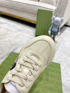 Gucci unisex sneakers, cream lace-up with padded heel and side stitching