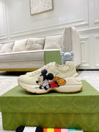 Gucci unisex sneakers, cream leather with Mickey Mouse and red-yellow cartoon detail