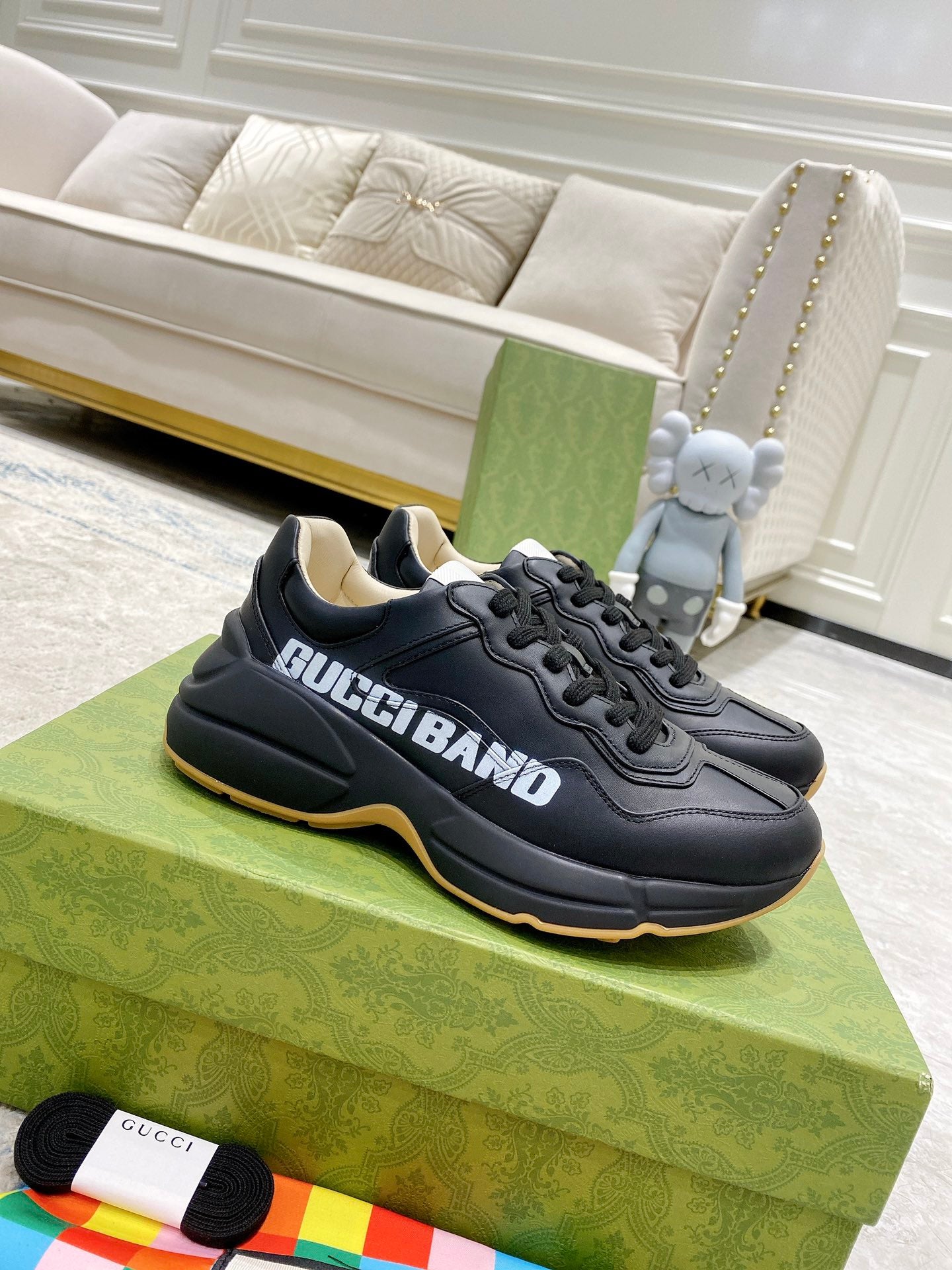 Gucci unisex sneakers, black leather with GucciBand lettering and gum-style sole