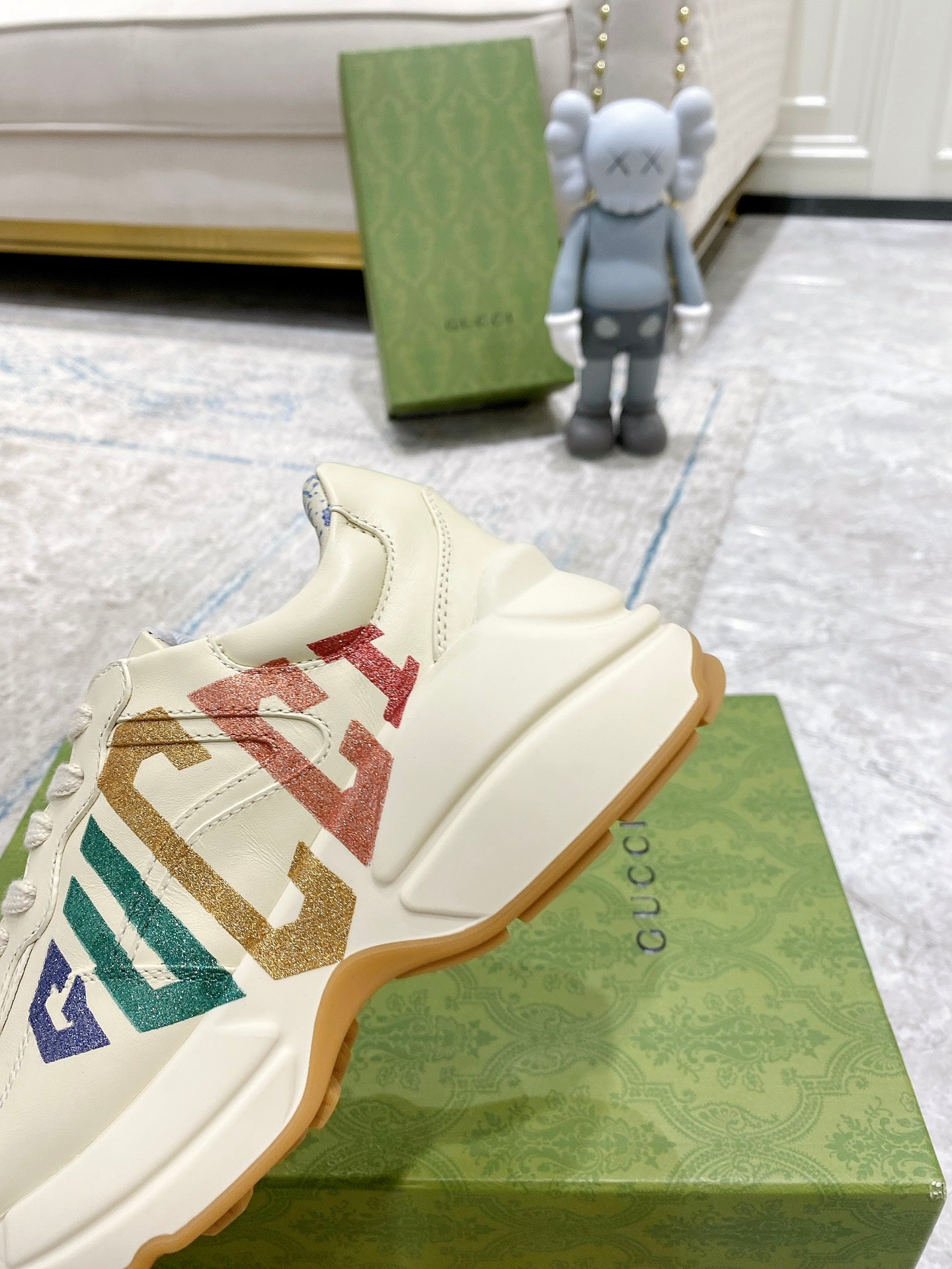 Gucci unisex sneakers, cream uppers with colorful GG lettering and gum sole