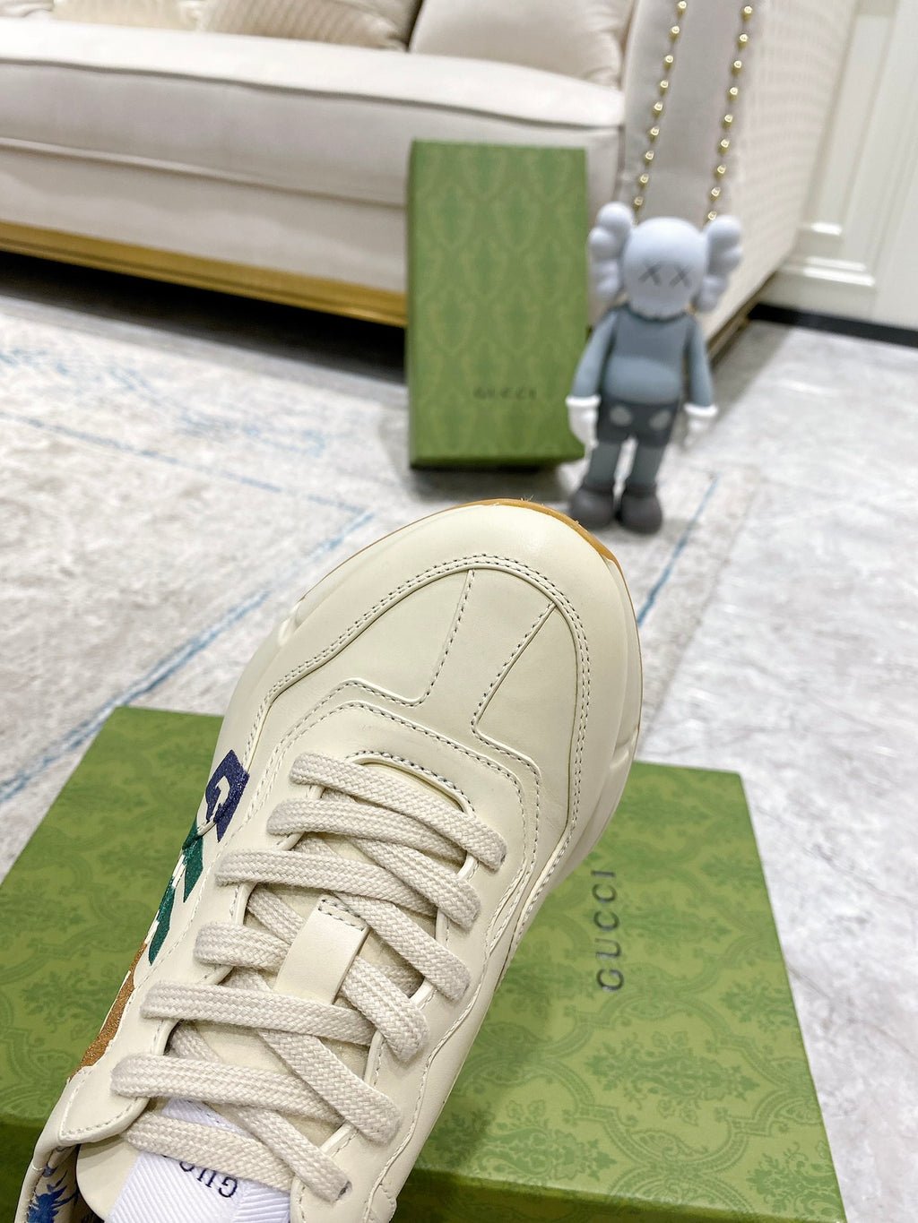 Gucci unisex sneakers, cream uppers with side GG detail and lace-up front