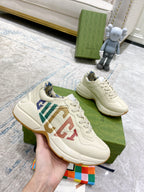 Gucci unisex sneakers, cream lace-up with multicolor GG lettering on the side