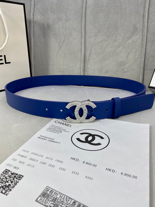 Blue leather belt with silver-tone rhinestone CC buckle and round hole detailing