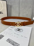 Brown leather Chanel belt with gold-tone rhinestone CC logo buckle and multiple holes