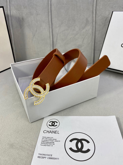 Brown leather Chanel belt in white box with gold-tone rhinestone CC buckle and holes