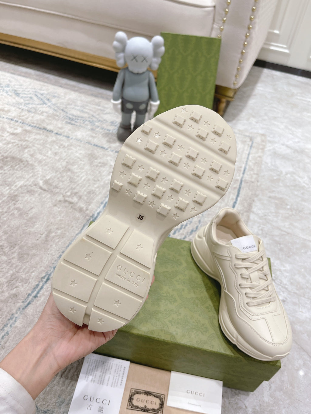 White Gucci unisex sneaker outsole with tread pattern and heel grip.
