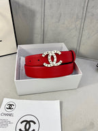 Chanel belt in white gift box: red textured leather strap with gold logo buckle.
