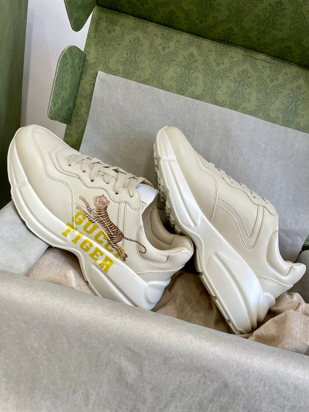 Gucci unisex sneakers, cream leather uppers with tiger logo and yellow GUCCI TIGER text