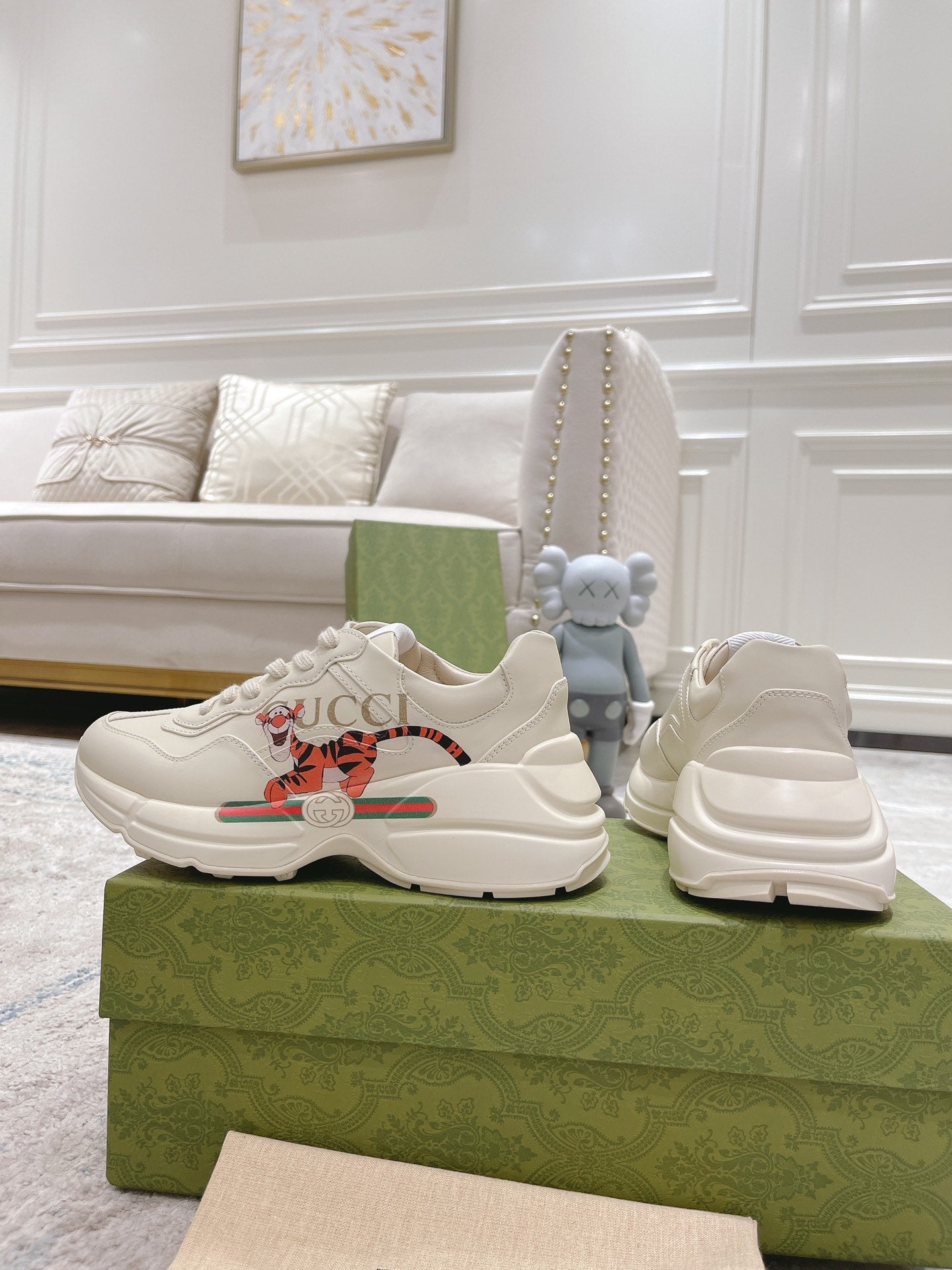 Gucci unisex white luxury sneakers set with lace-up pair and stacked heel profile