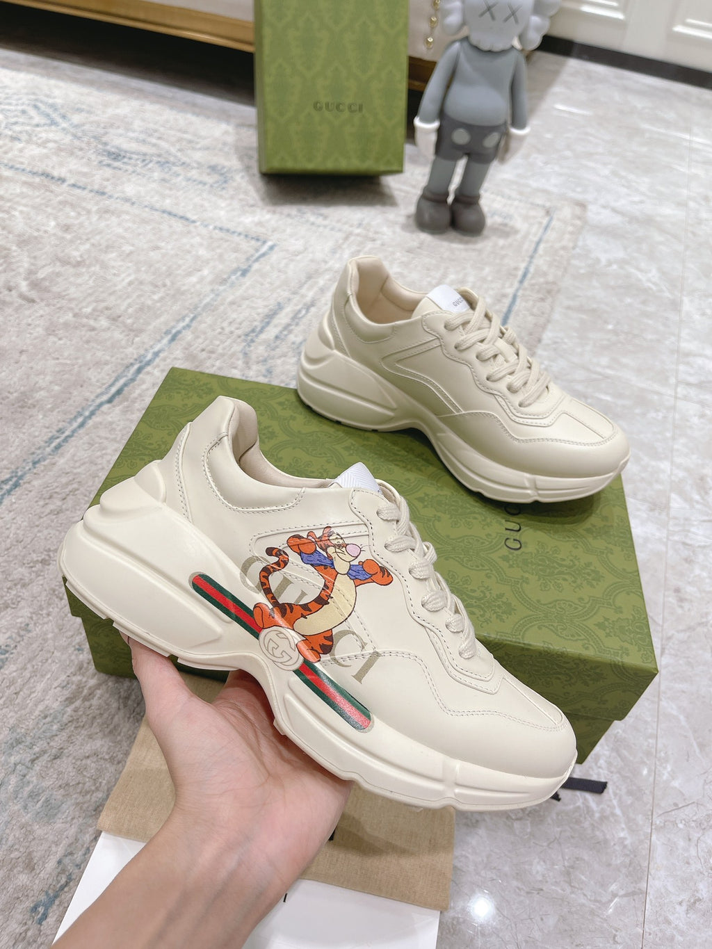 White Gucci unisex sneaker, lace-up with colorful cartoon logo on the side