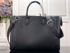 Men's Louis Vuitton structured tote bag, front view with adjustable strap and buckles