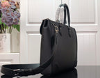 Men's Louis Vuitton structured tote bag with shoulder strap and metal buckles
