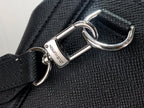 Men's Louis Vuitton tote bag close-up of metal strap hook hardware on textured leather