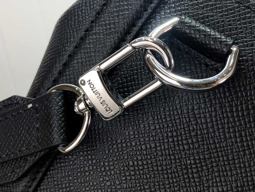 Black leather handbag with silver O-ring strap hardware