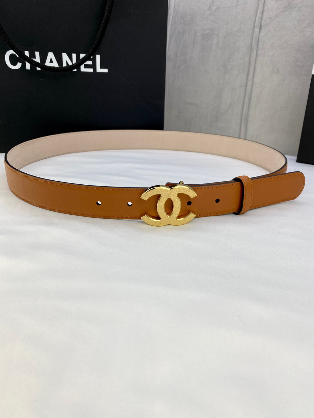 Tan leather Chanel belt with gold-tone CC buckle