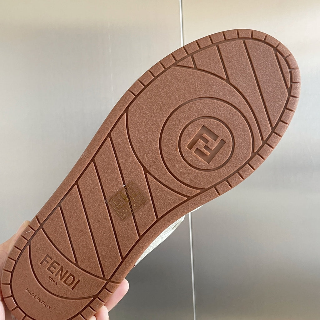 Brown rubber outsole with Fendi logo tread for unisex sneakers