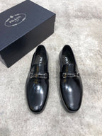 Prada unisex black leather loafers, metal buckle strap