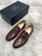 Prada brown leather penny loafers with strap across instep, low profile