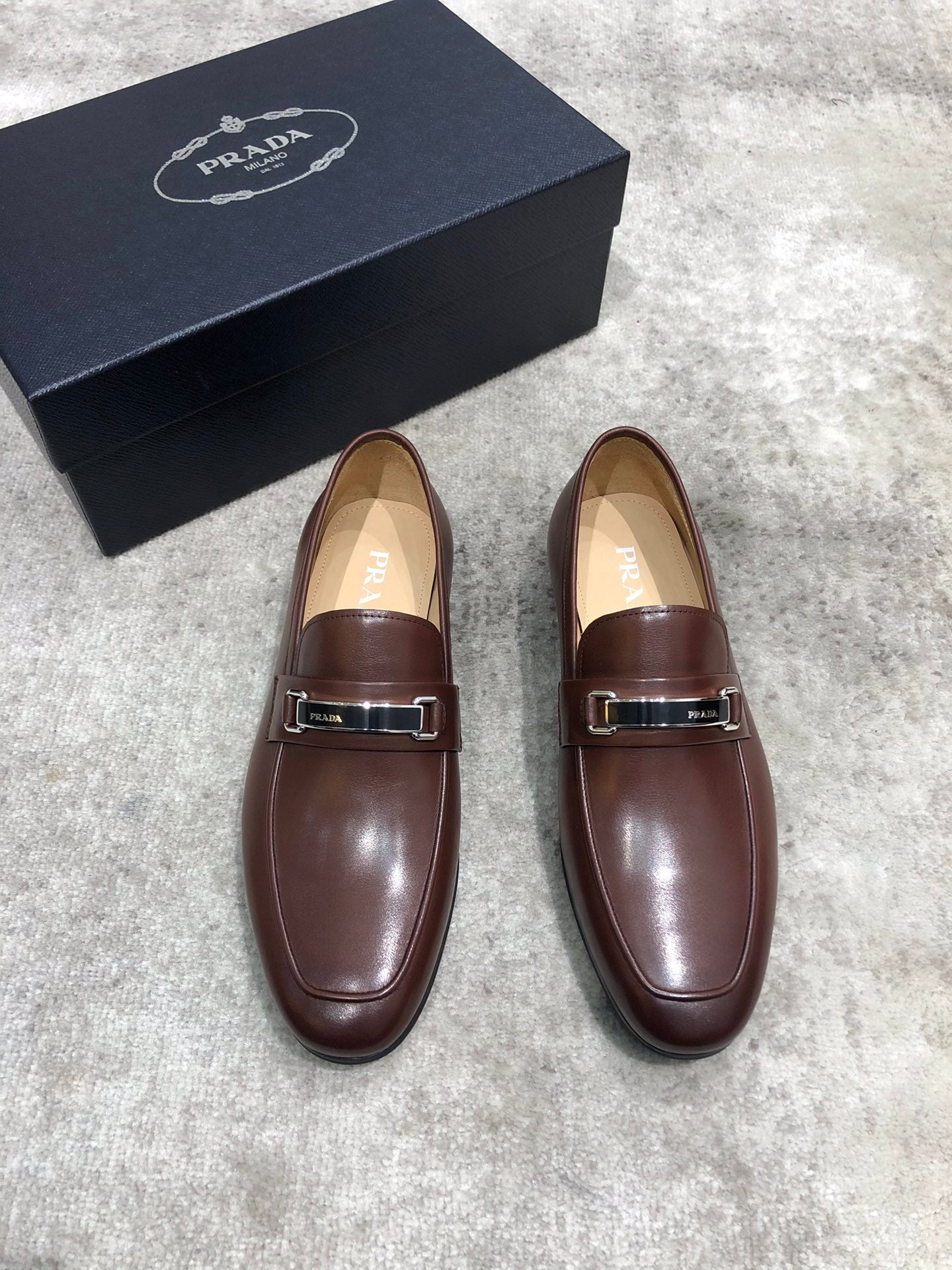 Prada brown leather loafer shoes with buckle strap, rounded toe