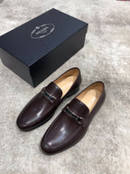Prada unisex leather loafers, dark brown, side view with buckle detail