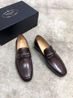 Prada unisex leather loafers, dark brown with buckle strap and almond toe
