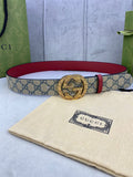 Gucci GG canvas belt with red leather lining and large gold-tone buckle