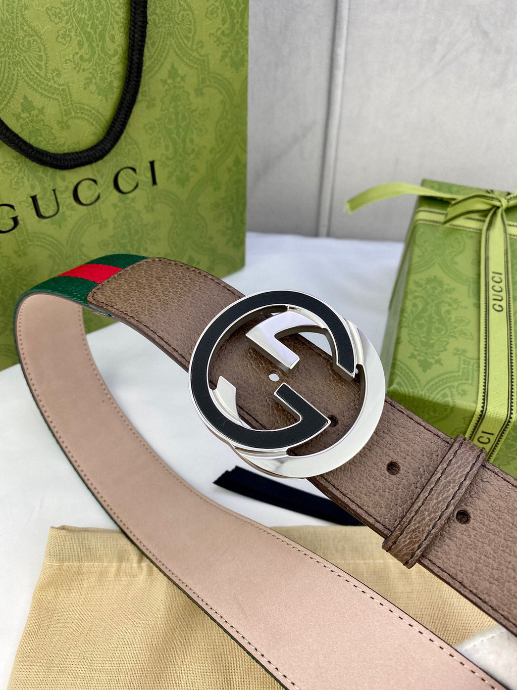 Gucci buckle belt detail: brown strap with green-red web stripe