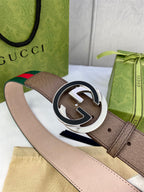 Gucci buckle belt detail: brown strap with green-red web stripe