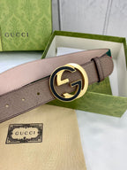 Gucci buckle belt with brown leather and round gold-tone GG buckle