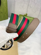 Gucci buckle belt end with brown leather and green-red striped section