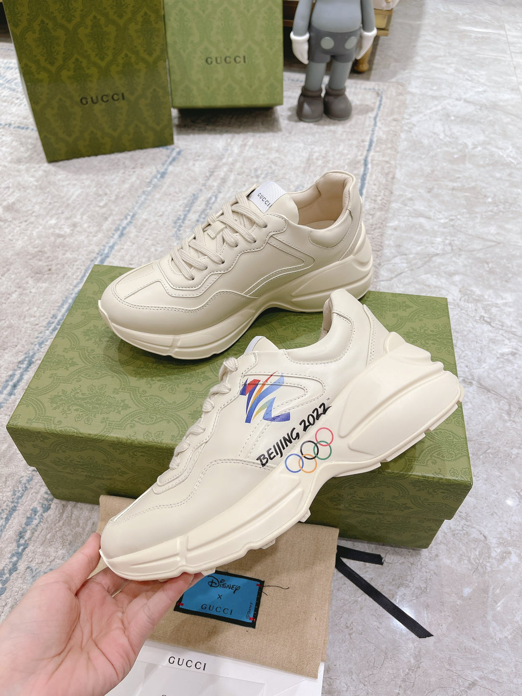 Gucci unisex white sneakers with Beijing 2022 graphic, lace-up style, two shoes