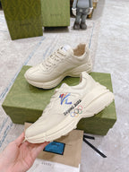 Gucci unisex white sneakers with Beijing 2022 graphic, lace-up style, two shoes