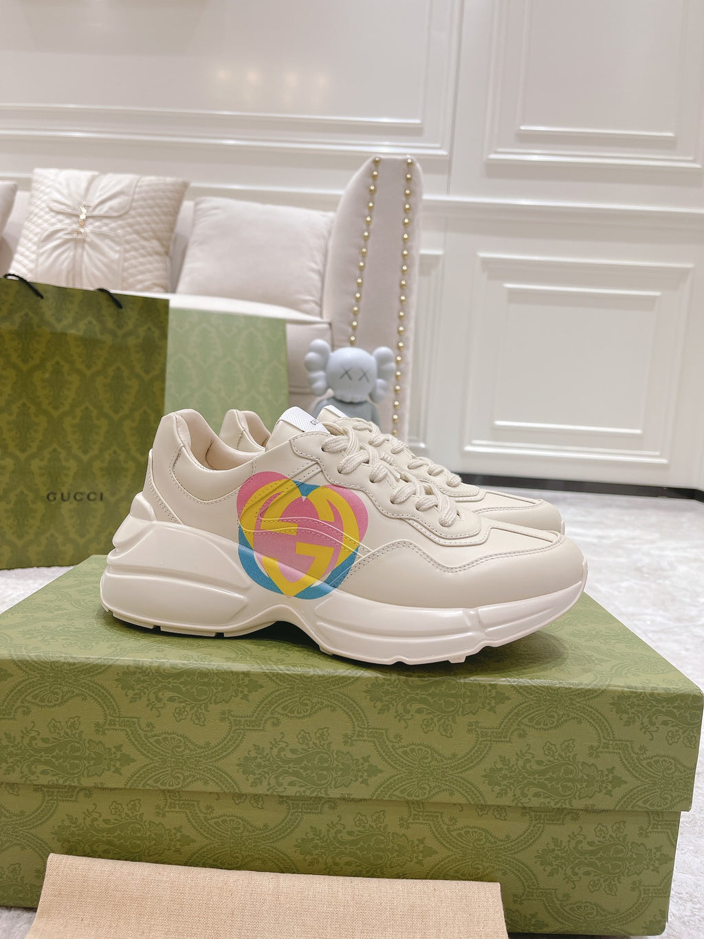 White Gucci unisex sneakers with multicolor heart GG logo, lace-up design