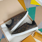 Louis Vuitton unisex sneakers, monogram canvas with brown laces and white rubber sole.