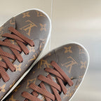 Louis Vuitton unisex sneaker toe with monogram pattern and brown lace-up front.