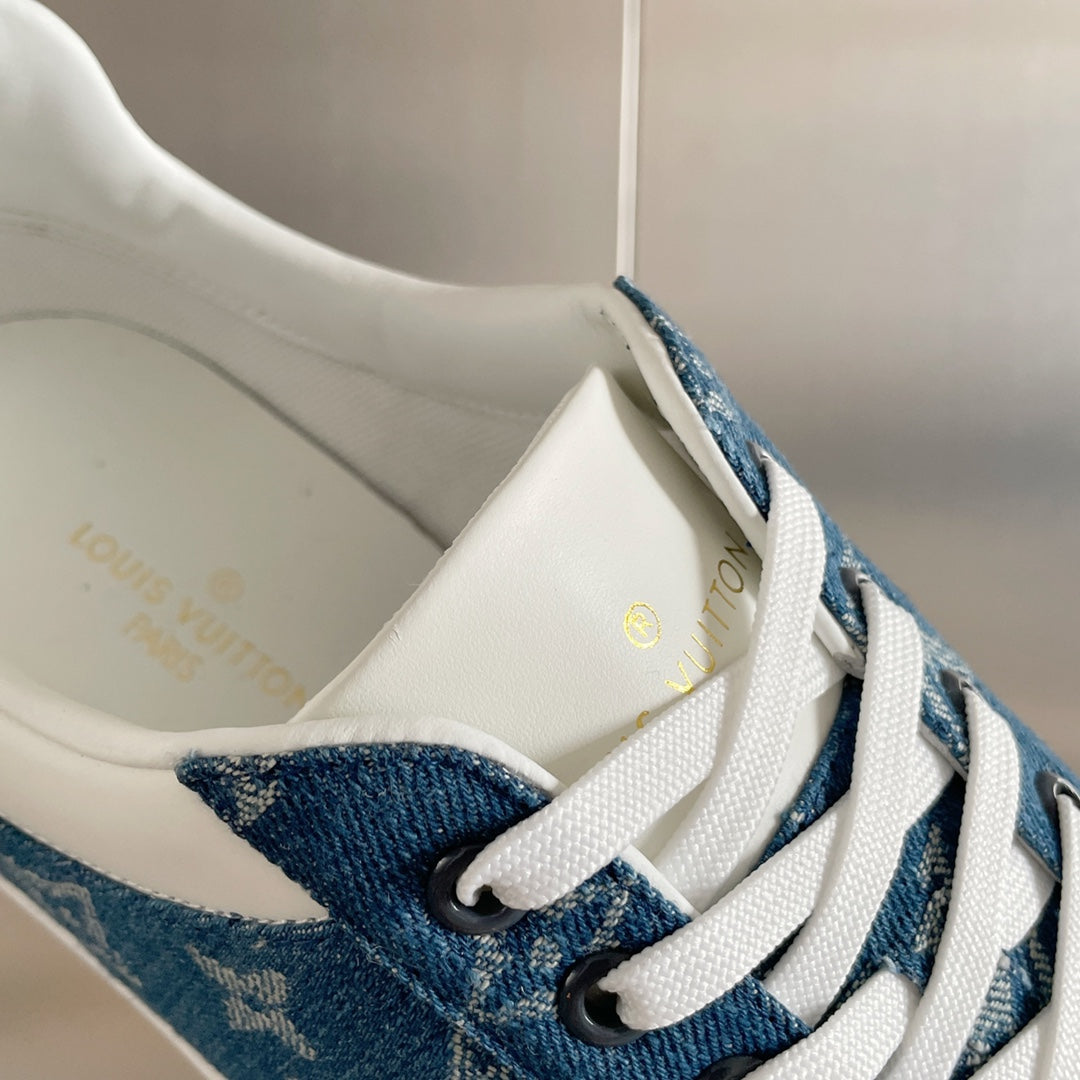 Louis Vuitton sneaker with blue denim upper, white laces, and interior lining view