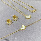 Gold butterfly jewelry set: necklace chain and matching stud earrings
