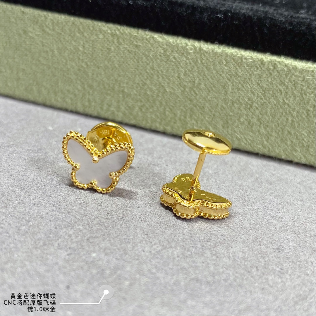 Gold butterfly hoop earring with clasp side view