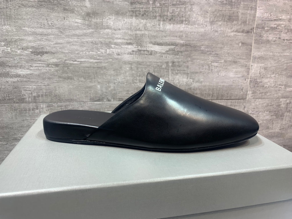 Black slide sandals with wide toe cover and BALENCIAGA logo strap