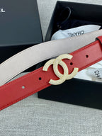 Red belt with gold-tone Double C buckle over light-beige reverse side