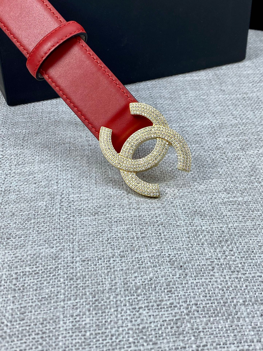 Red leather belt with gold-tone Double C buckle detail