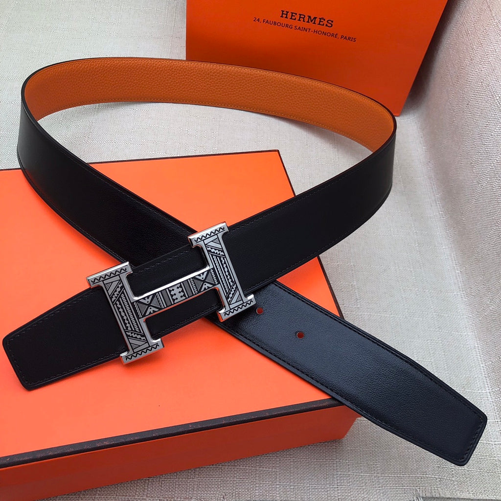 Hermes belt set: black strap with H buckle and matching orange strap on orange box