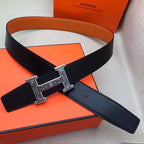 Hermes belt set: black strap with H buckle and matching orange strap on orange box
