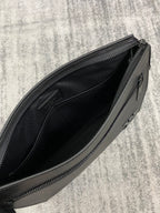 Louis Vuitton leather bag open view, black interior lining with zipper track