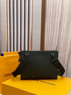 Louis Vuitton leather crossbody bag, black front view with rings and shoulder strap