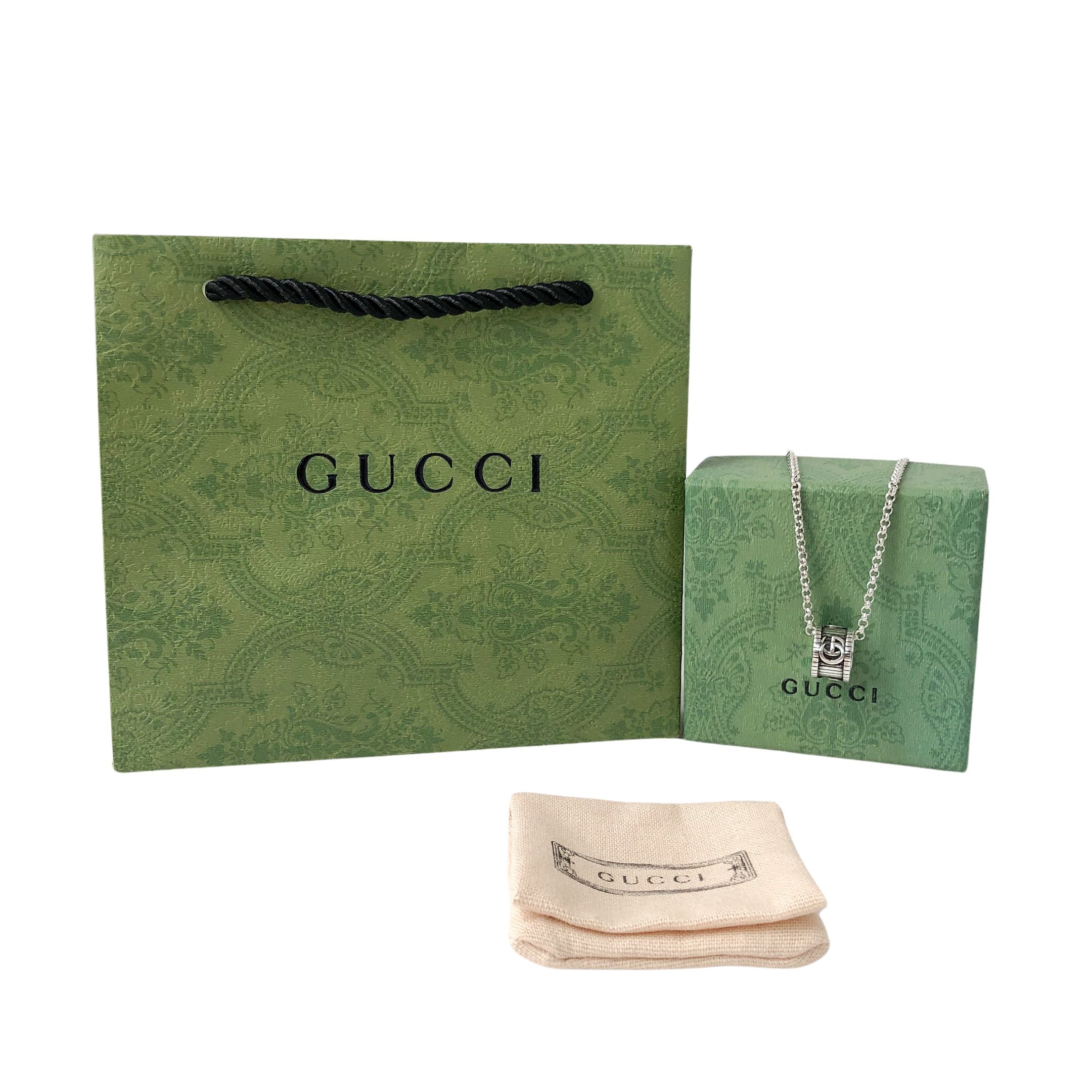 Gucci necklace in green gift bag with pouch