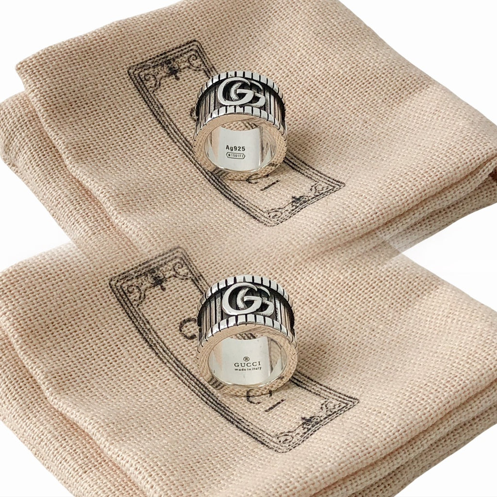 Gucci logo ring on beige fabric pouch, silver-tone with hallmark