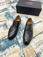 Prada unisex lace-up oxford shoes, dark leather with brogue perforations, with box