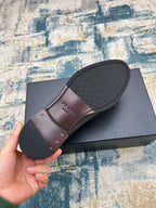Black leather lace-up derby shoe outsole with branded insole